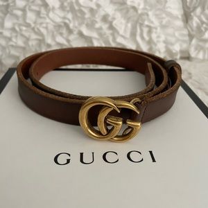Gucci leather belt with two G’s.